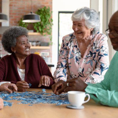 Seniors playing a jigsaw puzzle