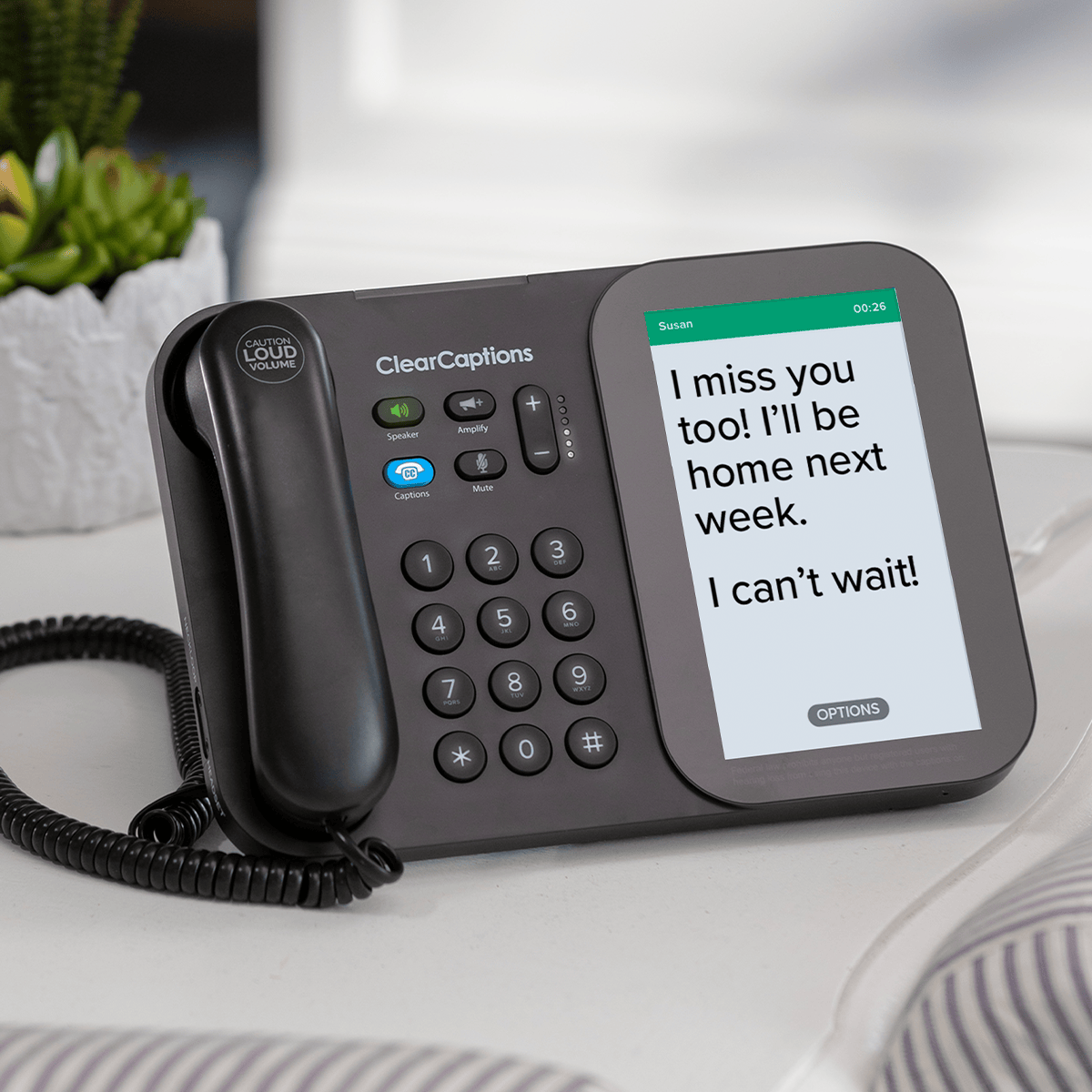 ClearCaptions caption phone displaying a conversation on screen