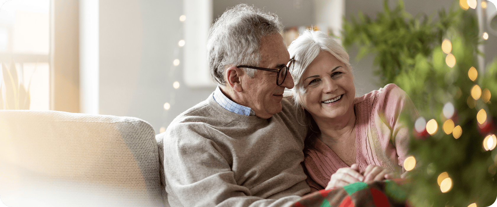 Senior couple hugging and smiling