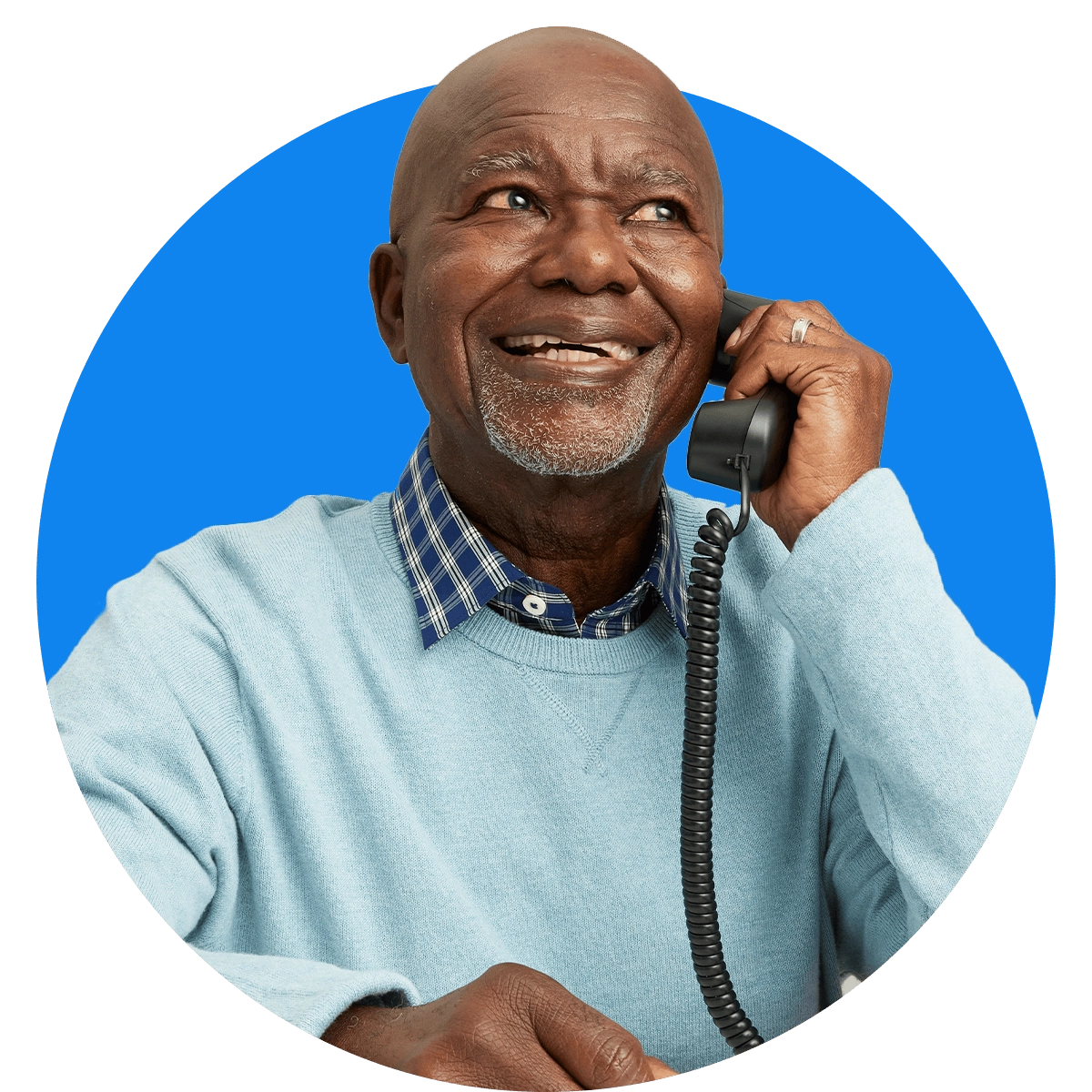 Senior using the ClearCaptions caption phone