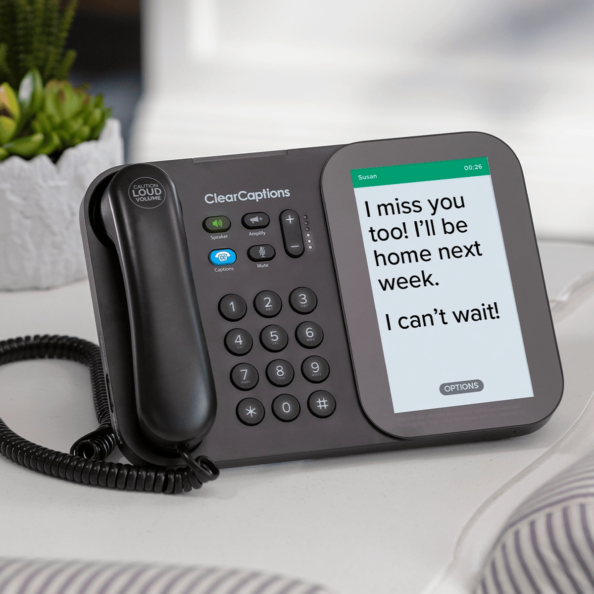 ClearCaptions caption phone displaying a conversation on screen