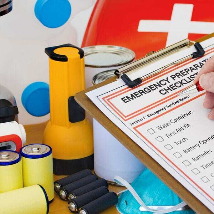 J3208_EmergencyPrep_684x684 Emergency preparation checklist surrounded by emergency items