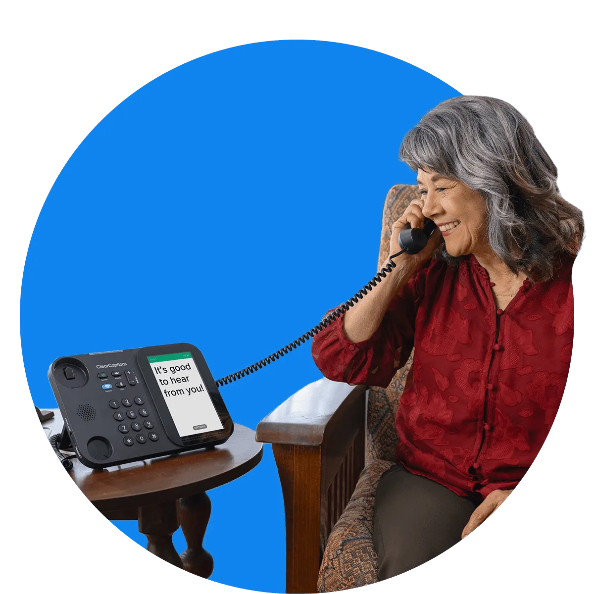 Section-2_Woman Smiling older woman using the ClearCaptions caption phone