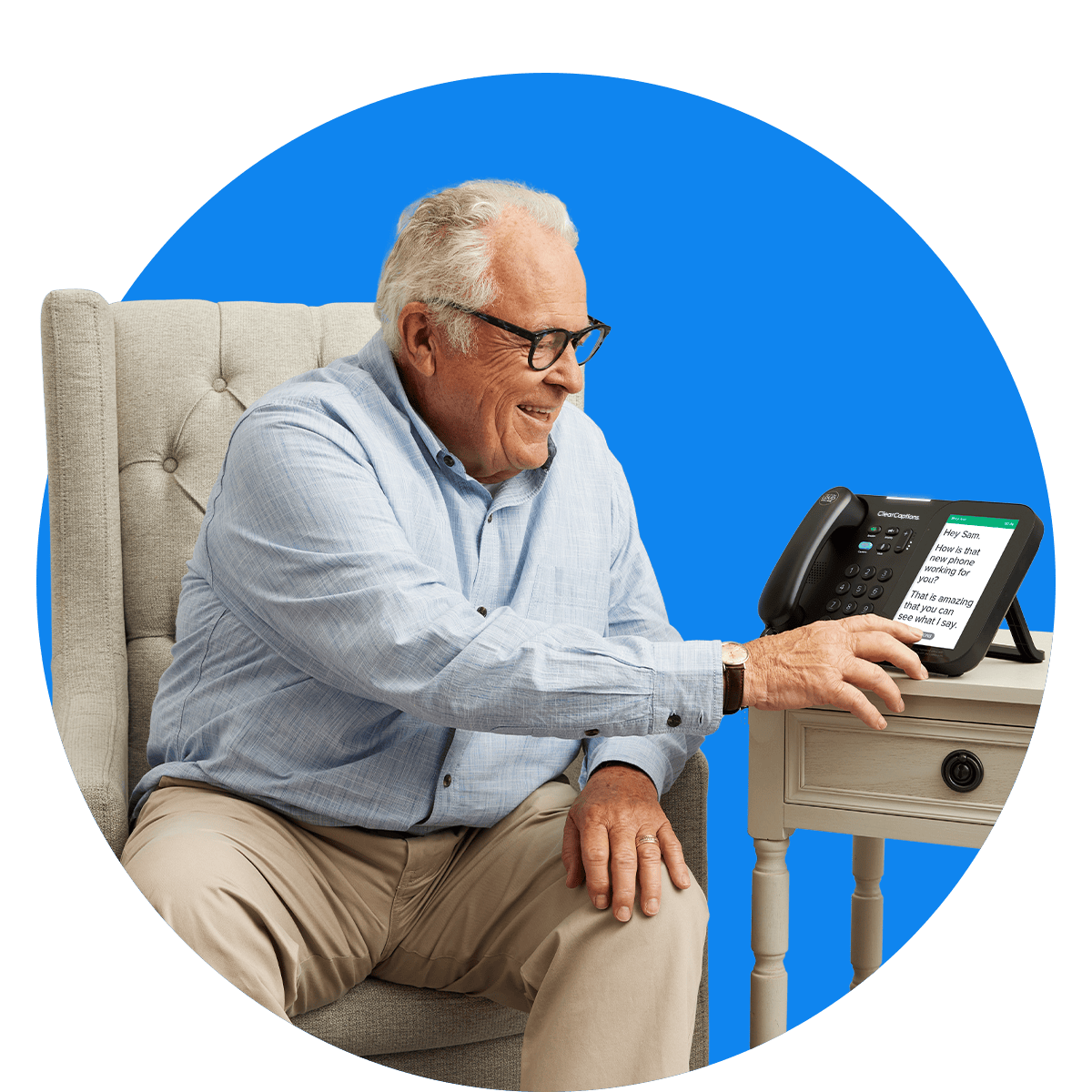 Senior interacting with ClearCaptions caption phone screen